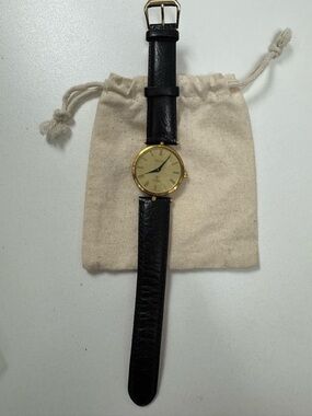 Gucci Gold Dial Watch with Black Leather Strap